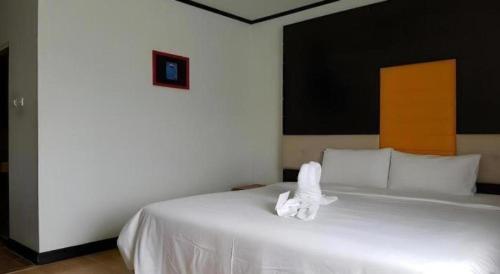 Postel nebo postele na pokoji v ubytování Cactus Resort & Hotel