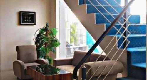 Гостиная зона в Zenith Hotel