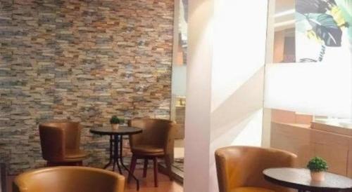 Гостиная зона в Zenith Hotel