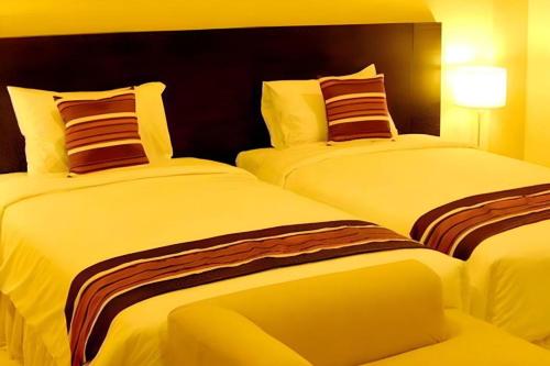 Кровать или кровати в номере The Residence Airport & Spa Hotel