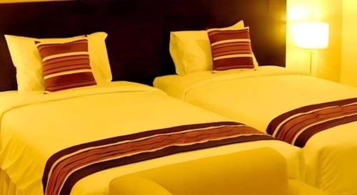 Кровать или кровати в номере The Residence Airport & Spa Hotel