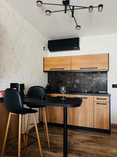 Kuchyň nebo kuchyňský kout v ubytování Apartmani Tiske noći