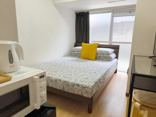 Una cama o camas en una habitación de DP House