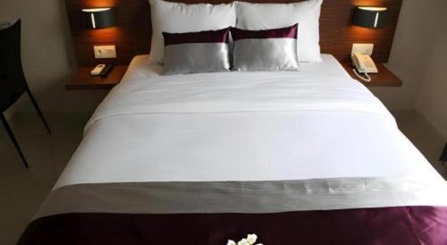 Кровать или кровати в номере Amantis Hotel