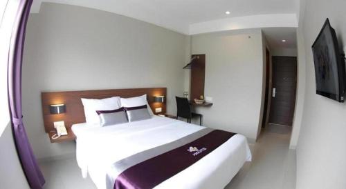 Кровать или кровати в номере Amantis Hotel