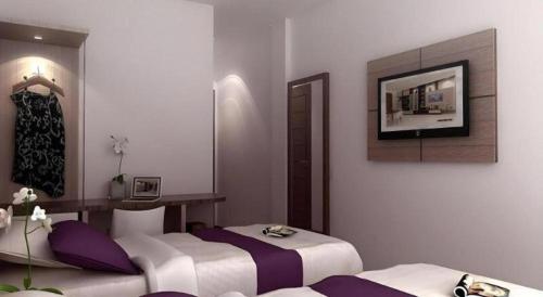 Кровать или кровати в номере Amantis Hotel