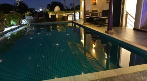 a swimming pool on top of a building at D Villas in Colombo