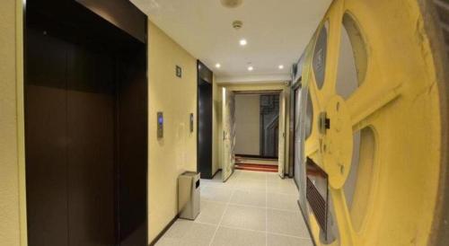 a hallway of a building with a hallwayngth at Ibis Harbin Normal University in Harbin
