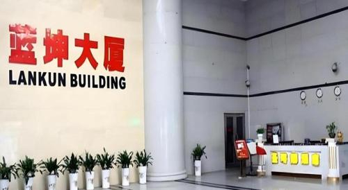 a building with a sign that reads lenin building at Sheng Lin Na Hotel Minzhi Branch in Shenzhen