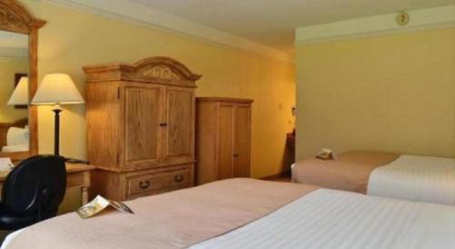 Postel nebo postele na pokoji v ubytování Quality Inn