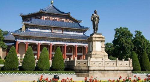 a building with a statue in front of it at V8 Ziyuangang Hotel in Guangzhou