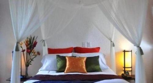 Letto o letti in una camera di Flamingo Hotel