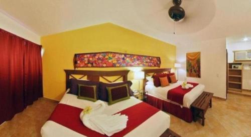 Letto o letti in una camera di Flamingo Hotel