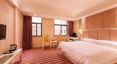 Letto o letti in una camera di mingjia hotel