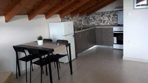 Kuchyň nebo kuchyňský kout v ubytování Villa Eleni