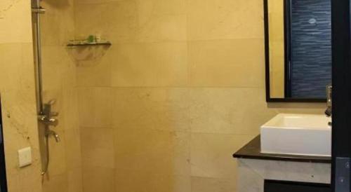 a bathroom with a shower and a sink at The BCC Hotel & Residence in Nagoya