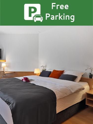 Postel nebo postele na pokoji v ubytování Centra Hotel Zurich