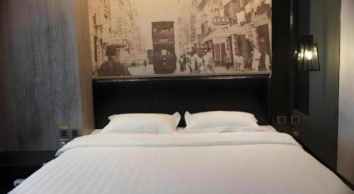 Cama o camas de una habitación en M1 North Point Hotel