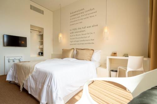 Una cama o camas en una habitación de Trafo Hotel Baden