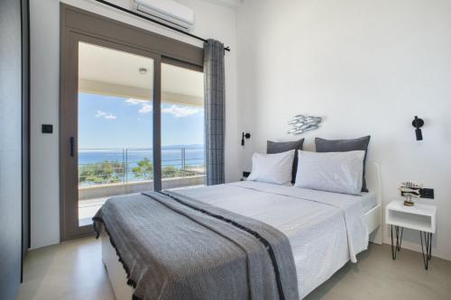 Develikia Private Villas, Auralīs, Ierissosにあるベッド