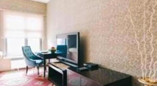 TV a/nebo společenská místnost v ubytování Mika Hotel