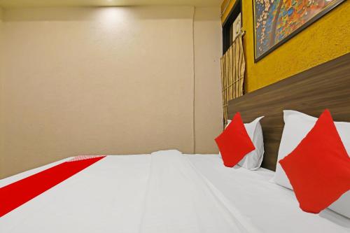 Ένα ή περισσότερα κρεβάτια σε δωμάτιο στο Hotel O Yuvraj