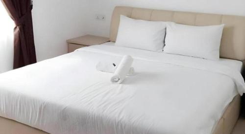 Кровать или кровати в номере Peach Hill Hotel & Cafe