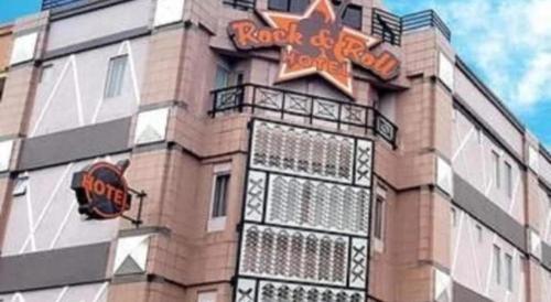 a building with a star on top of it at Rock & Roll Hotel Klang in Klang