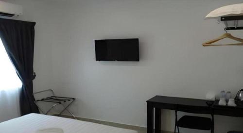 Televisyen dan/atau pusat hiburan di Hotel Seri Geliga