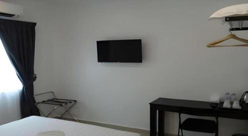 Televisyen dan/atau pusat hiburan di Hotel Seri Geliga