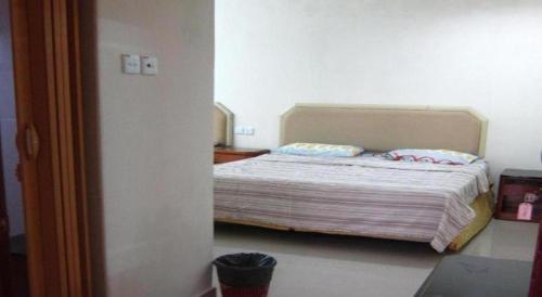 Кровать или кровати в номере Skudai Baru Hotel
