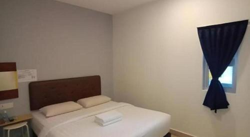 Ένα ή περισσότερα κρεβάτια σε δωμάτιο στο Hotel Viva