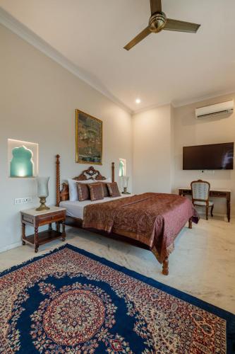 Postel nebo postele na pokoji v ubytování Rajasthan Palace - A Heritage Boutique Hotel in Jaipur