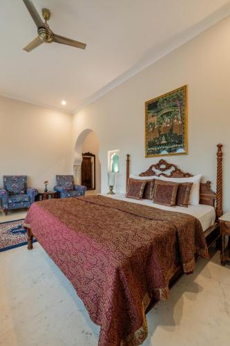 Postel nebo postele na pokoji v ubytování Rajasthan Palace - A Heritage Boutique Hotel in Jaipur