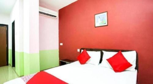 Postel nebo postele na pokoji v ubytování OYO 89539 Hotel Siswa
