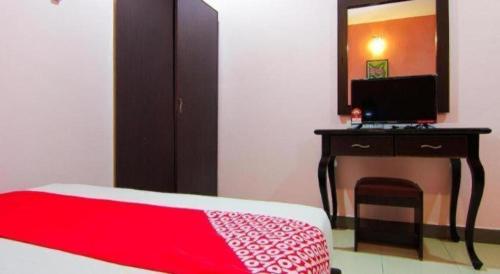 Televisyen dan/atau pusat hiburan di OYO 11343 Hotel Putra Iskandar