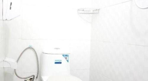 Ванная комната в OYO 89457 682 Lodge
