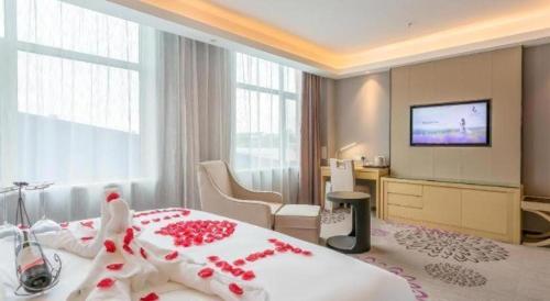 Ένα ή περισσότερα κρεβάτια σε δωμάτιο στο Lavande Hotel Langfang Xianghe