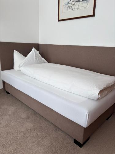 Кровать или кровати в номере Hotel Garni Senn