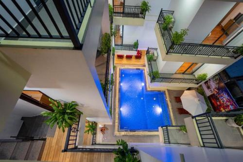 an overhead view of a swimming pool in a building at Hoi An Paradise Villa in Hoi An