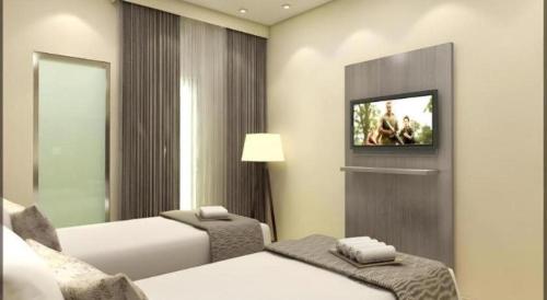 Кровать или кровати в номере Smart Budget Hotel