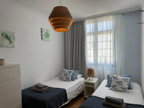 Postel nebo postele na pokoji v ubytování villa tyna