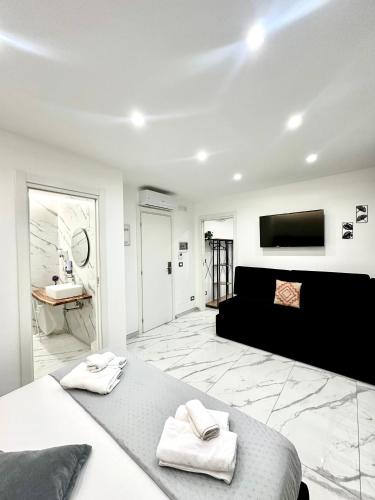 Oltremare Luxury Suitesにあるベッド
