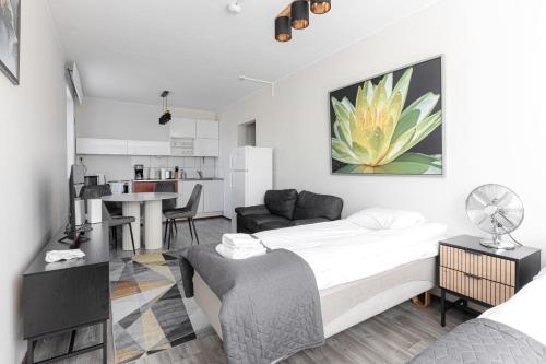 O bucătărie sau chicinetă la Kotimaailma Aparthotel Ankkuri - 4 Bedroom