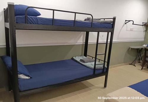 Кровать или кровати в номере Hotel Seri Intan Tampin