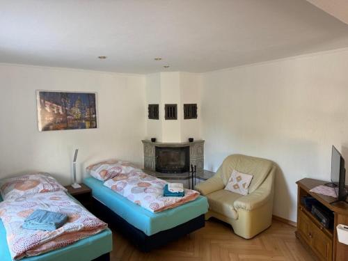 Ένα ή περισσότερα κρεβάτια σε δωμάτιο στο Hagemann Querfurter Straße 13