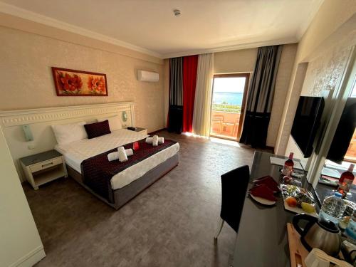 Postel nebo postele na pokoji v ubytování CasaFora Resort Hotel - All Inclusive Plus Concept