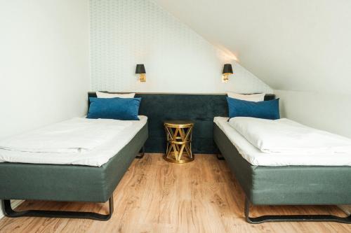 Cama o camas de una habitación en Hotel Scheelsminde