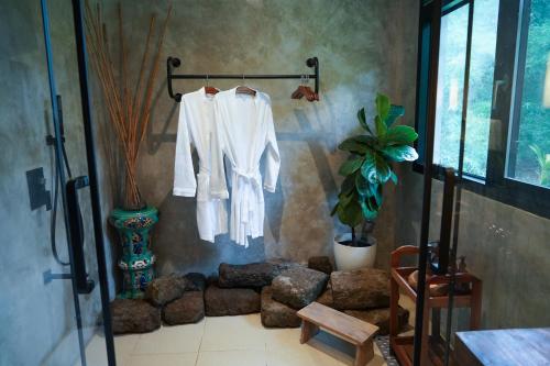 a room with a towel hanging on a wall at The Getaway Bailen in General Emilio Aguinaldo