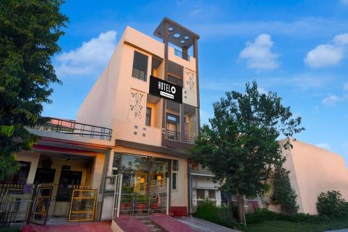 a building with a sign that reads lifeo at Townhouse Punnami Riverview Formerly Vihaan Square in Jaipur